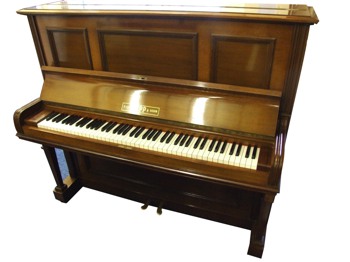 This 85 note upright is often straight strung. The bass strings will therefore be shorter than on an overstrung but there are advantages as the damping is more even and the tone also.